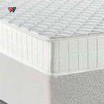 a mattress with a white surface